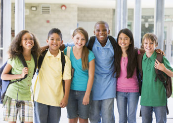 Elementary school class standing outside